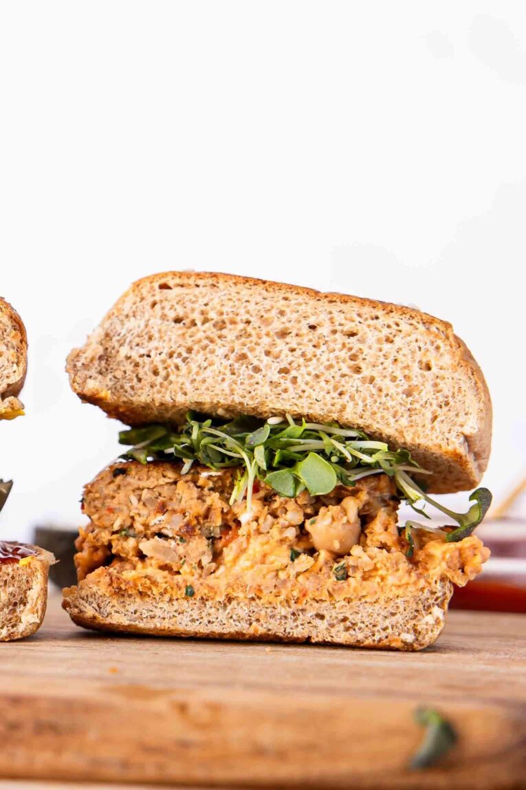 Veggie Burger on a bun sliced in half.