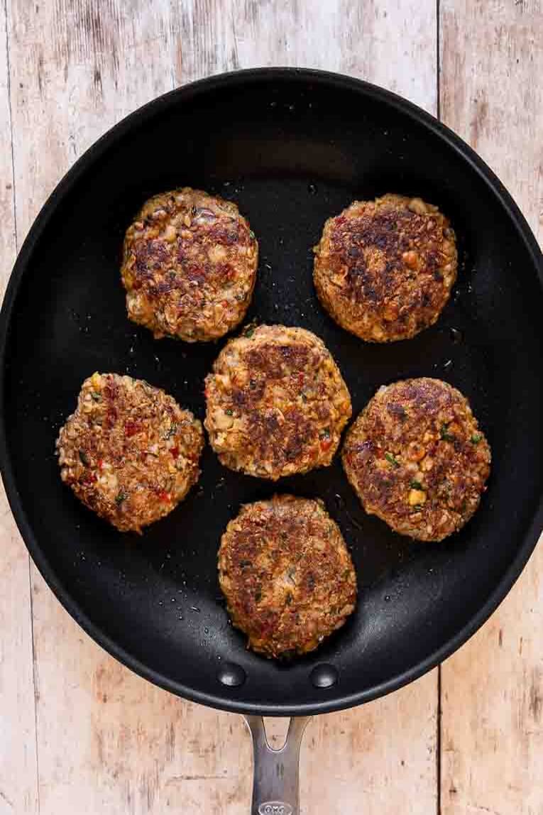 Easy Veggie Burger being pan fried.