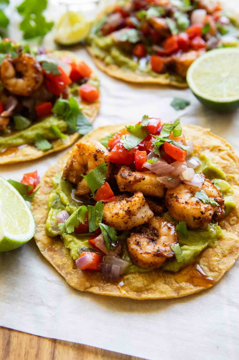Angled close up of Shrimp Guacamole Tostadas.