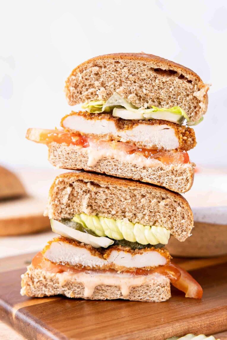 Stacked halved Spicy Chicken Sandwiches.