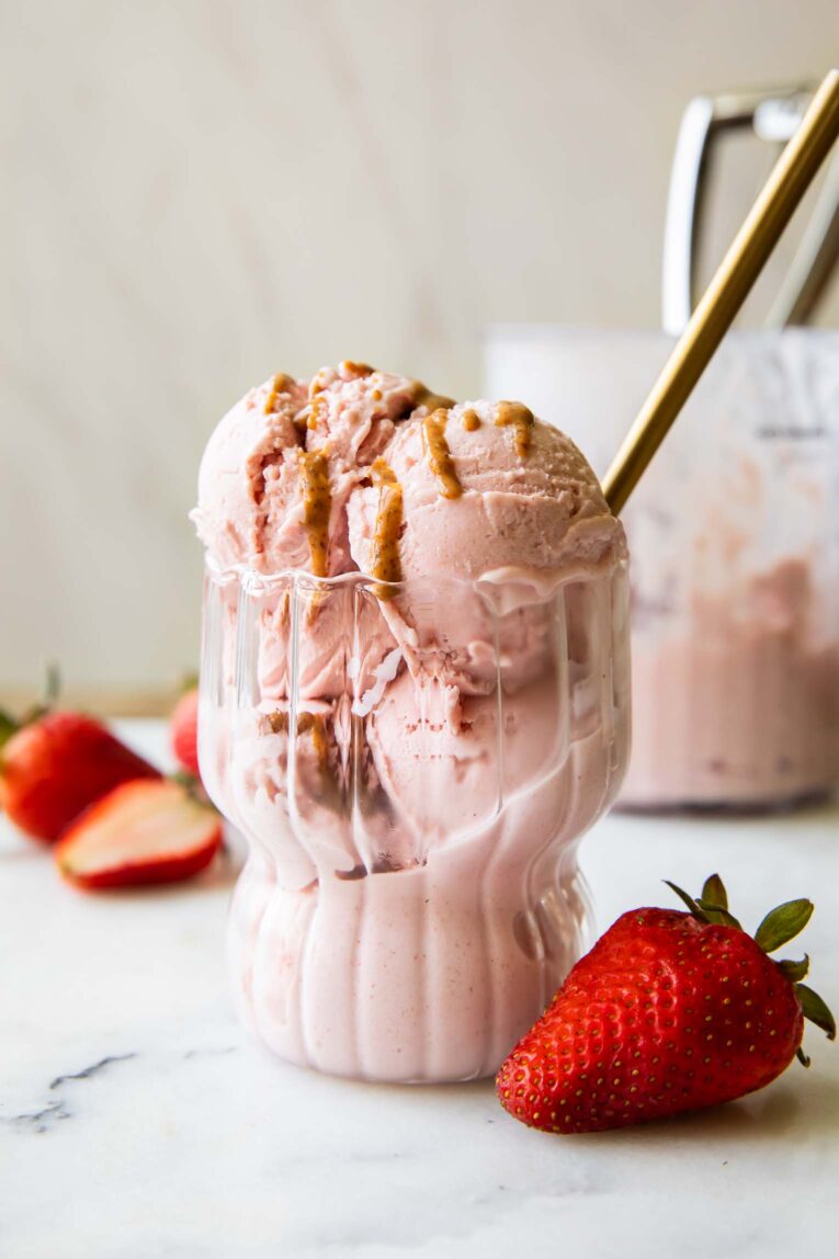 Across photo of Strawberry Protein Ice Cream in a glass.