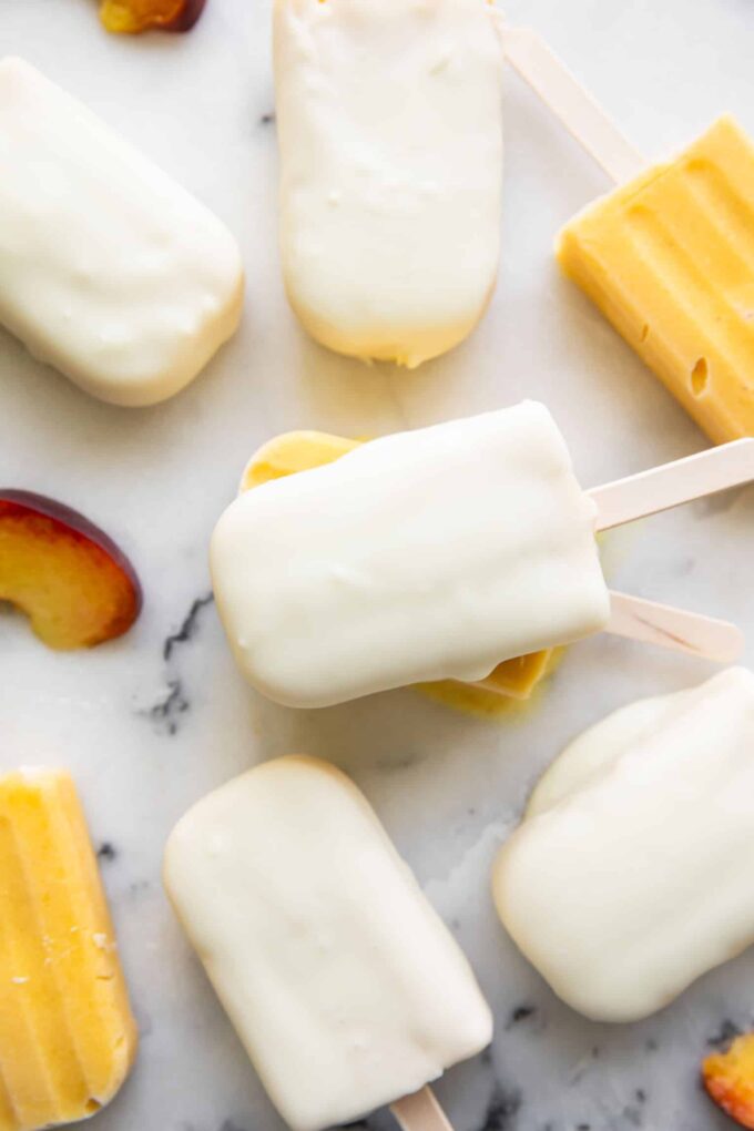 Coconut Peach Magnum Popsicles close up.