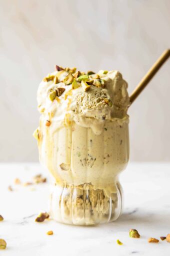 Pistachio Cottage Cheese Ice Cream in a parfait glass.