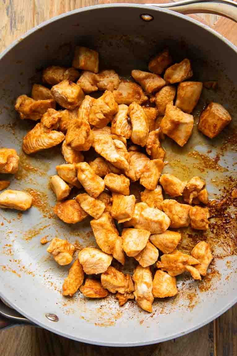 Ranch chicken cooking in a skillet.
