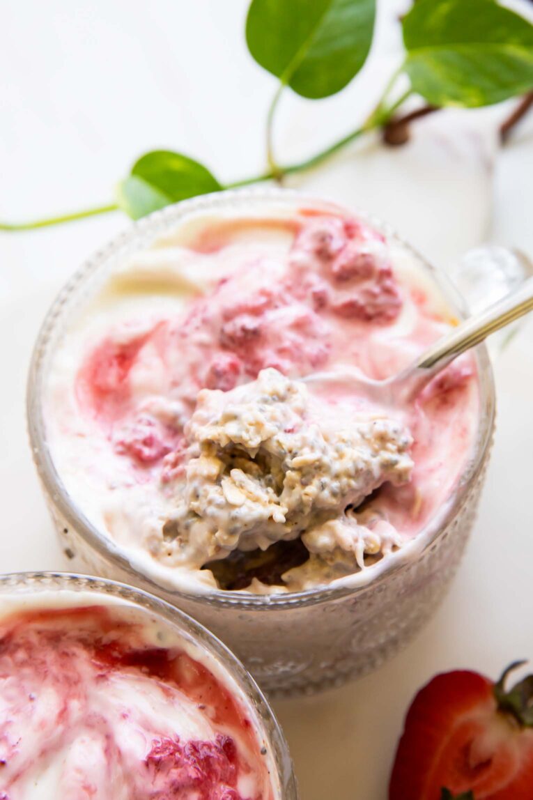 Strawberry overnight oats with bite taken out.