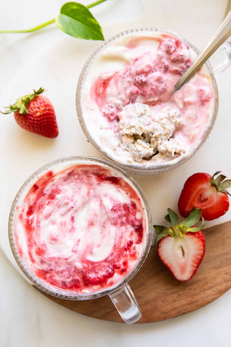 Strawberry overnight oats in jars.