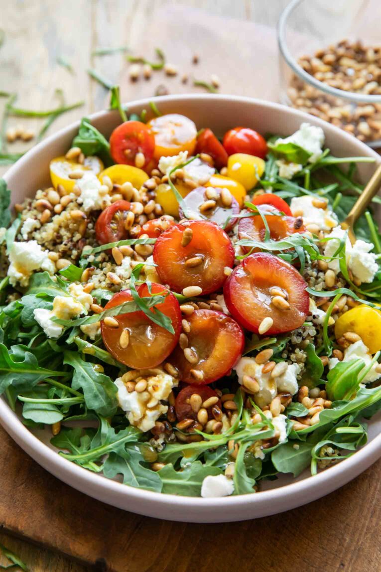 Angled photo of Cherry Plum Goat Cheese summer salad recipe.