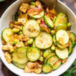 Chili Crisp Cucumber Salad recipe in a bowl.