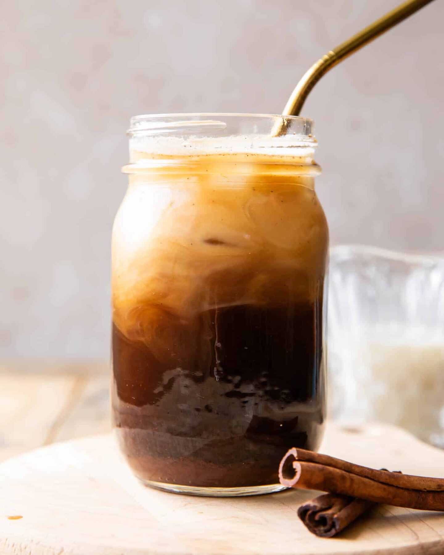 Iced Horchata Shaken Espresso in a glass with a straw.