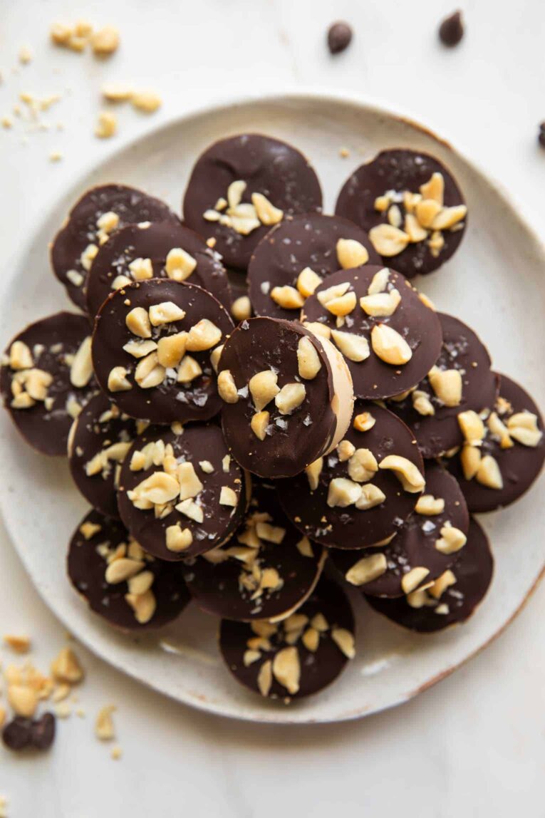 Plate with frozen Snickers Protein Bites.