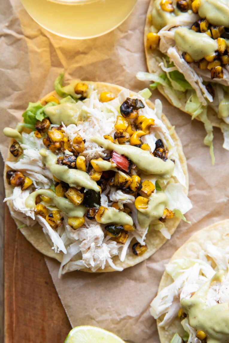 Close up easy shredded chicken tostada.