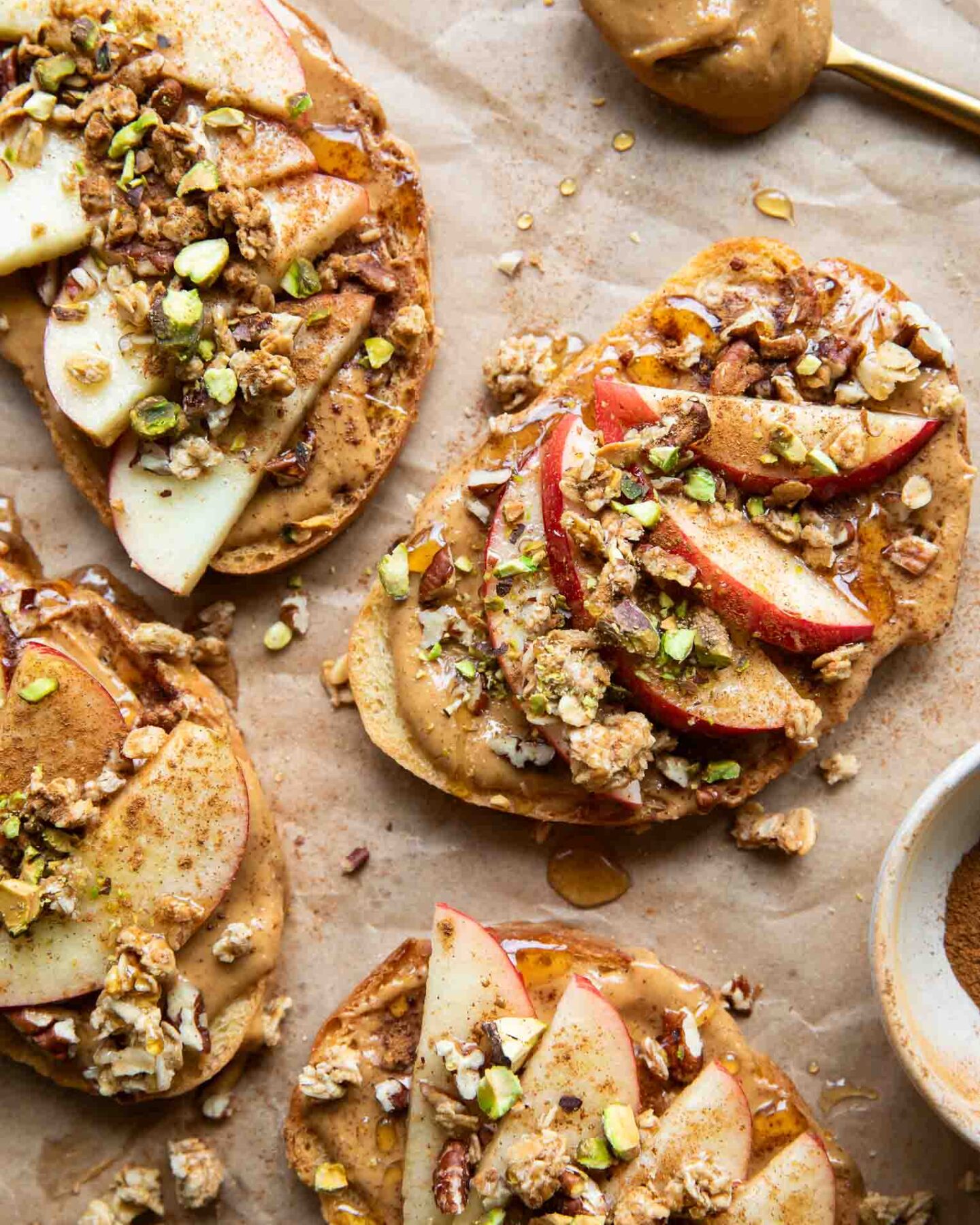 Apple Cinnamon Peanut Butter Breakfast Toast on parchment paper.