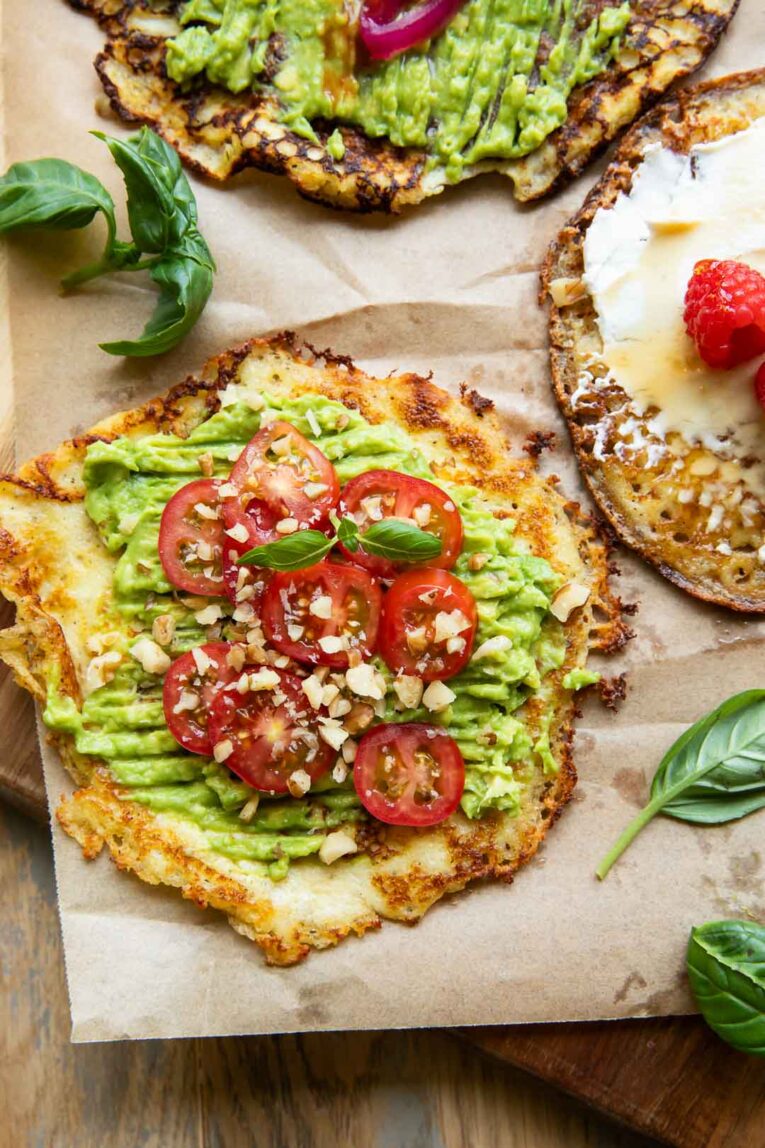 Close up of Cottage Cheese Breakfast Rounds with avocado topping.
