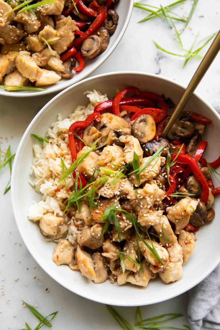 Top Photo General Taos Chicken with rice and red pepper.