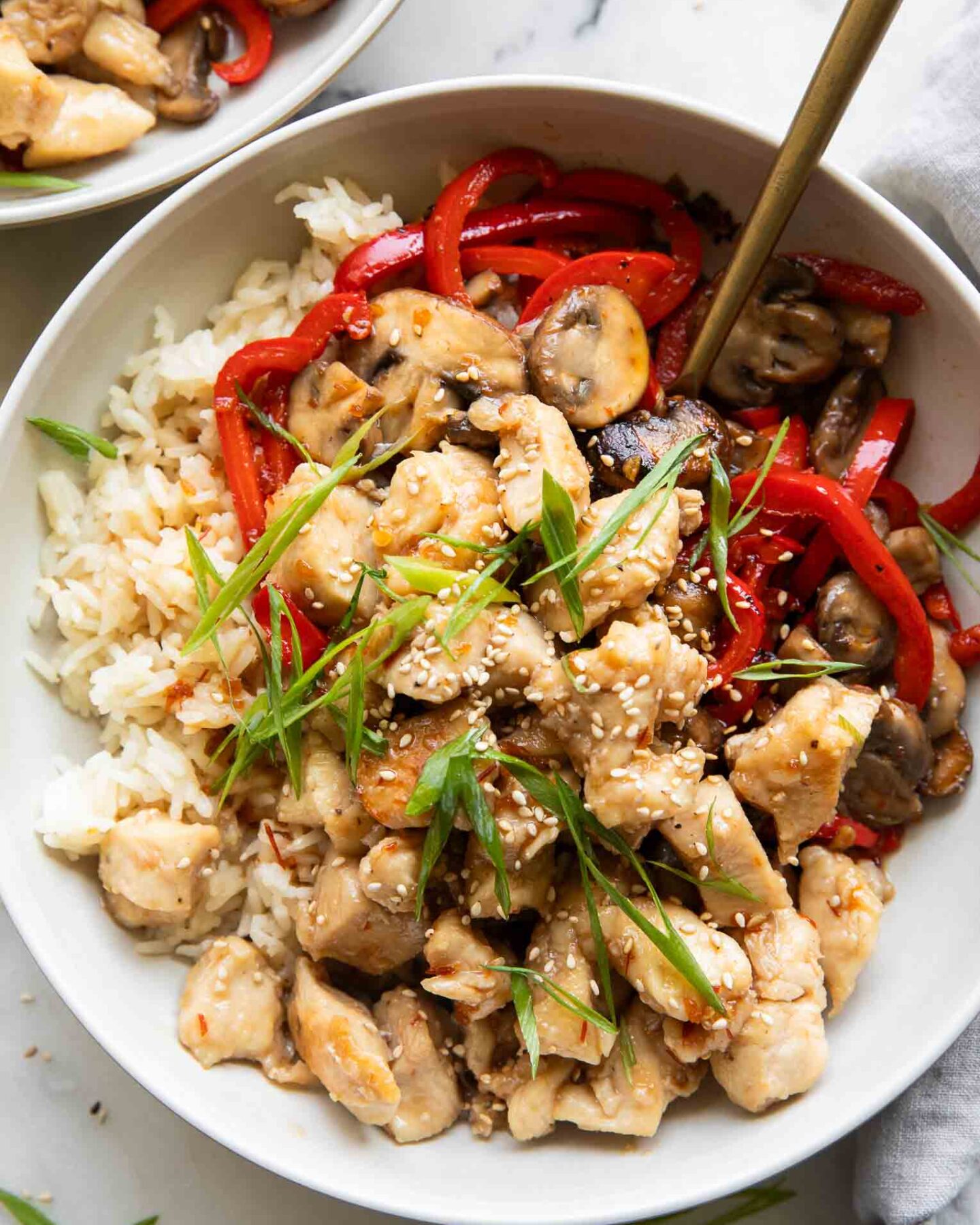 Top Photo General Taos Chicken with rice and red pepper.