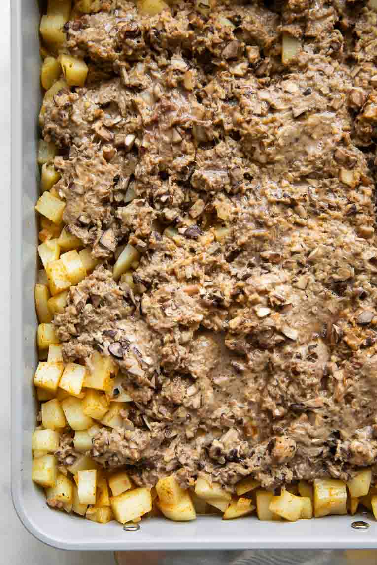 Potatoes and beef in a baking dish.