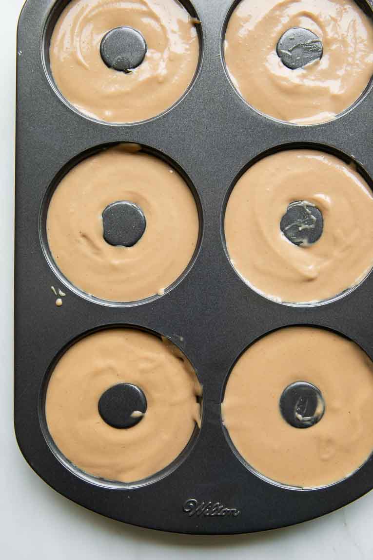 Healthy Donut batter in a donut pan.