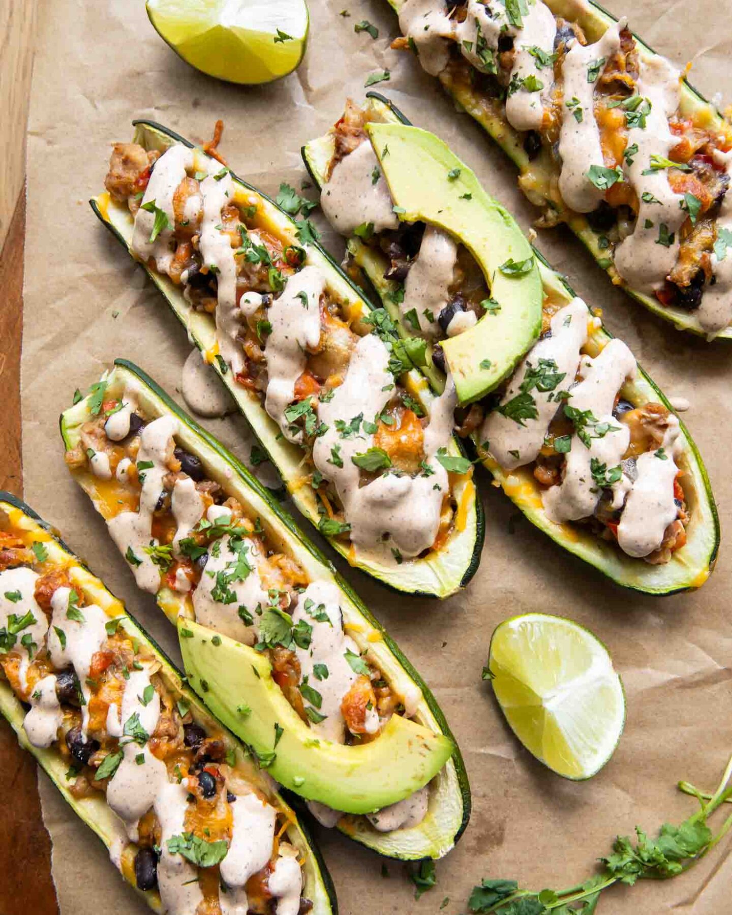 Southwestern Zucchini Boats topped with cream sauce.
