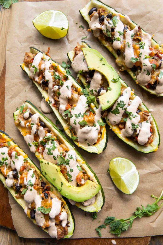 Southwestern Zucchini Boats topped with cream sauce.
