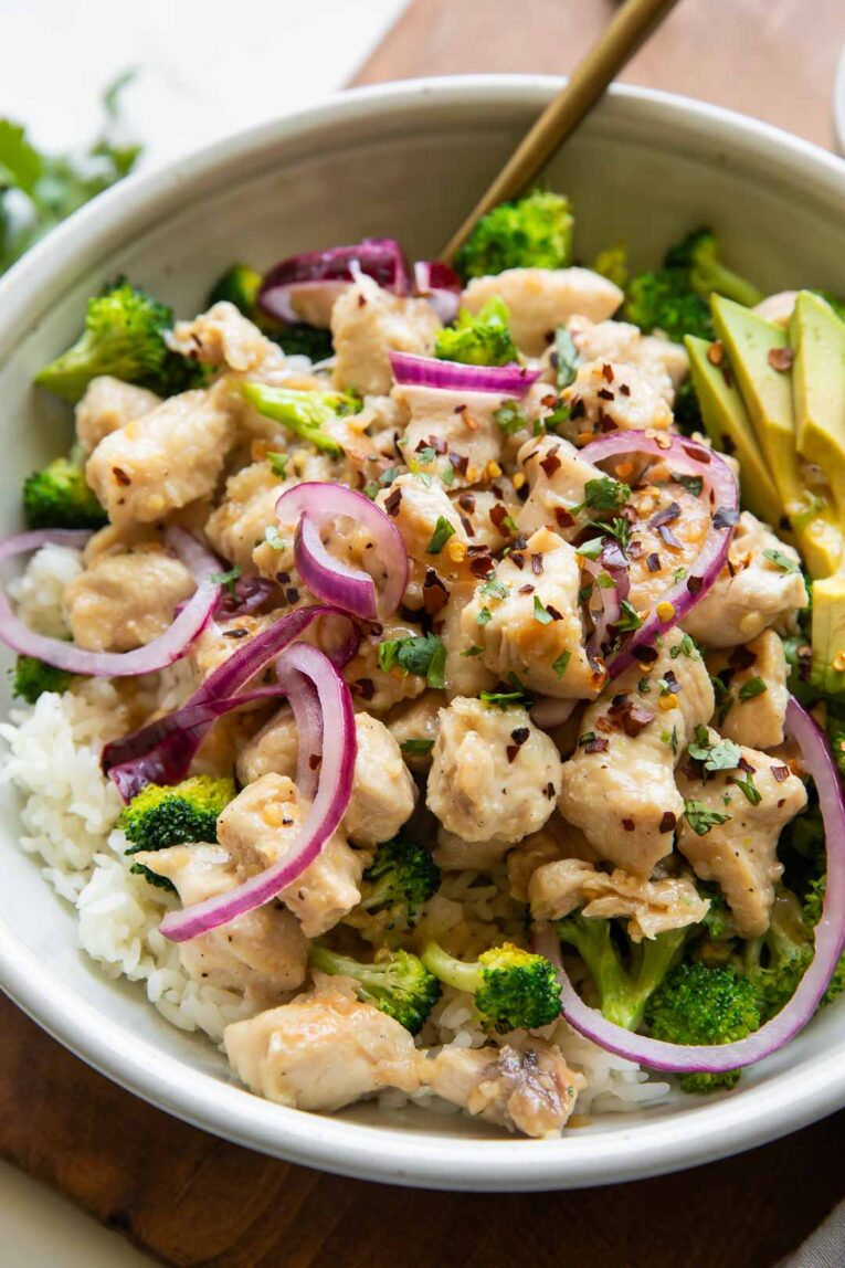 Angled photo of Sticky Garlic Butter Chicken Bowls.