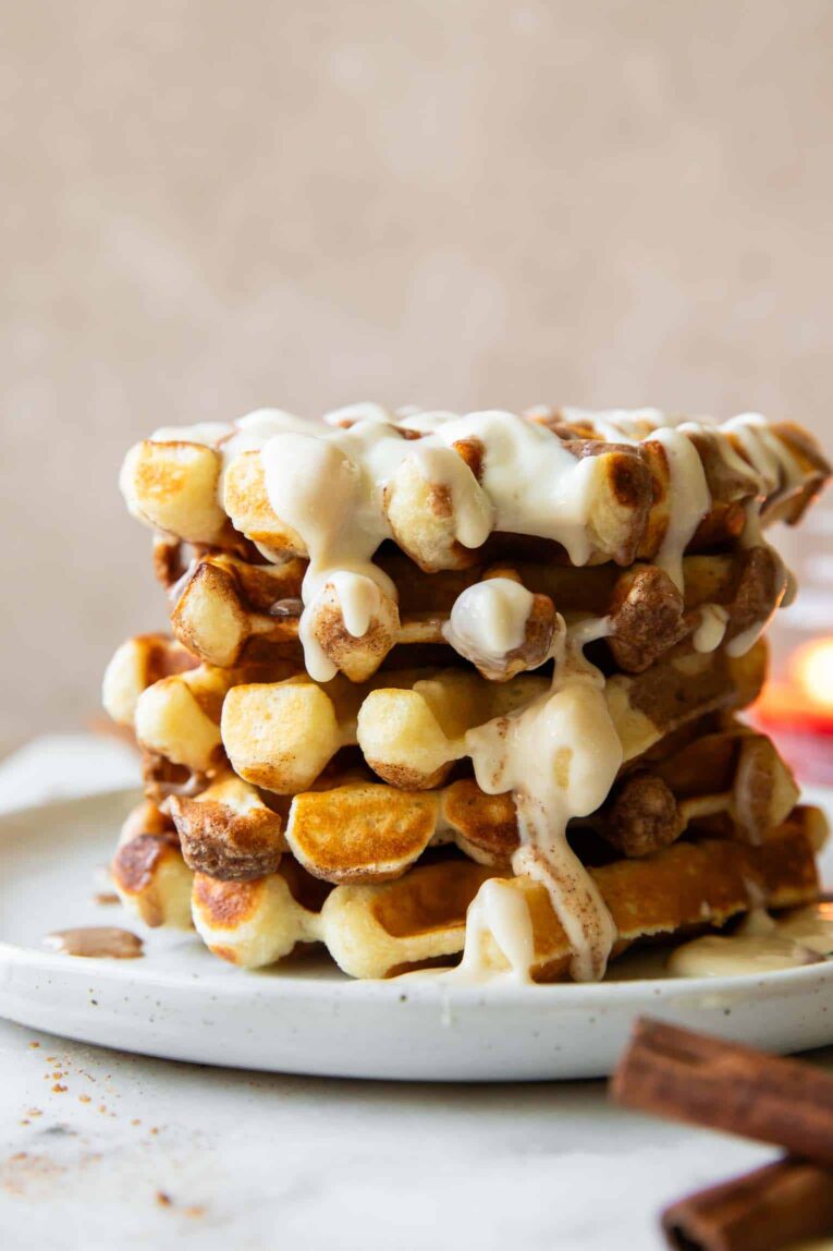 Stack of cinnamon roll waffles.