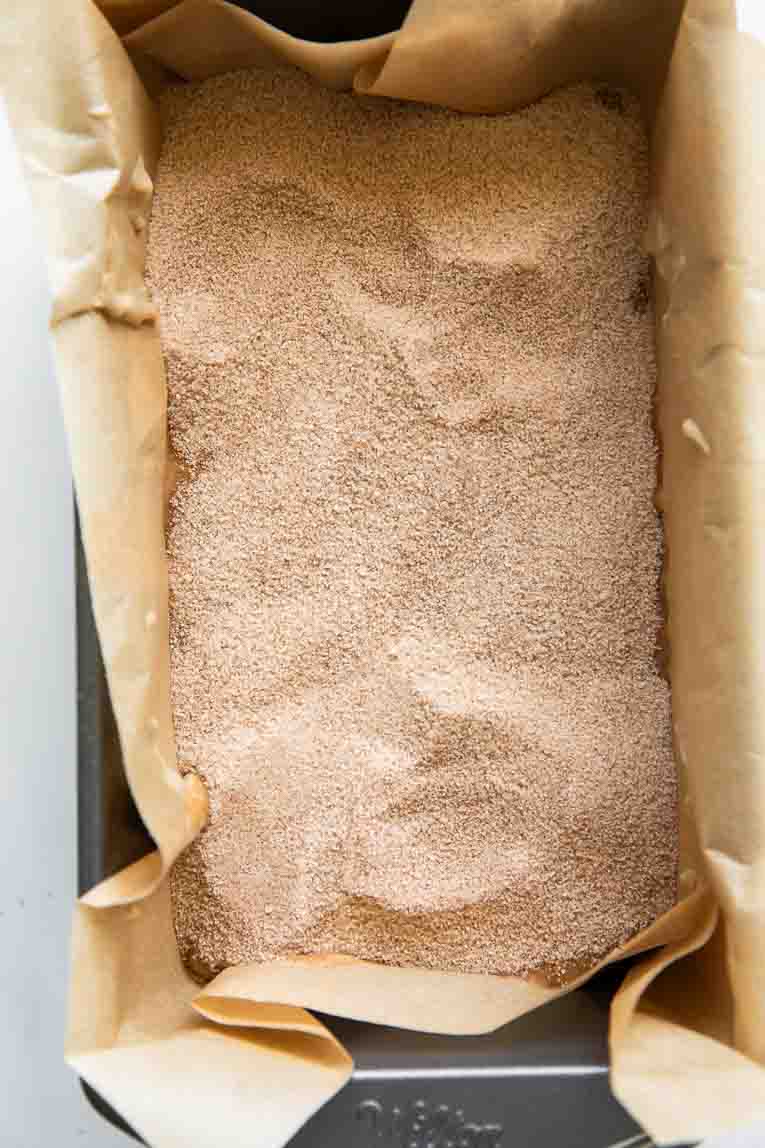 Cottage Cheese Banana Bread Batter in a loaf topped with cinnamon and sugar.