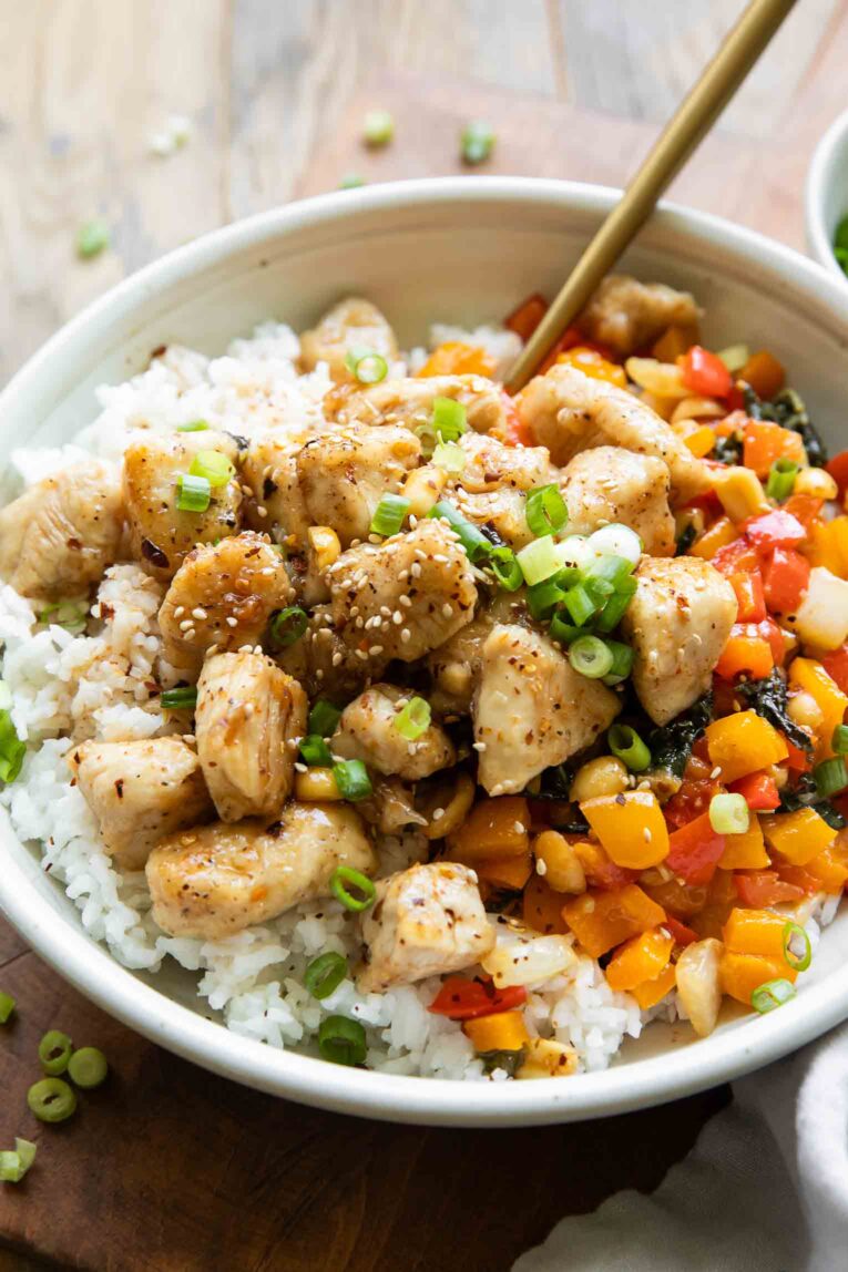 Kung Pao Chicken in a white bowl.