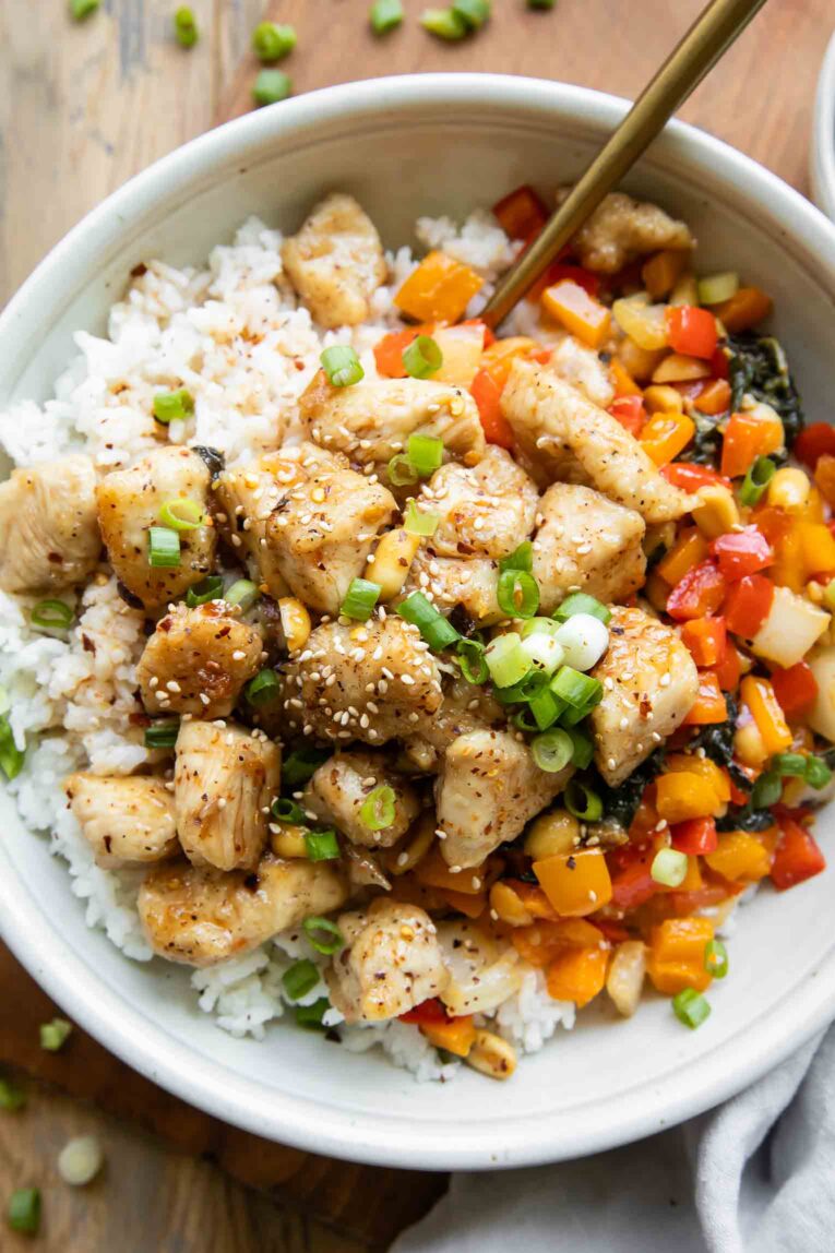 Kung Pao Chicken in a white bowl.