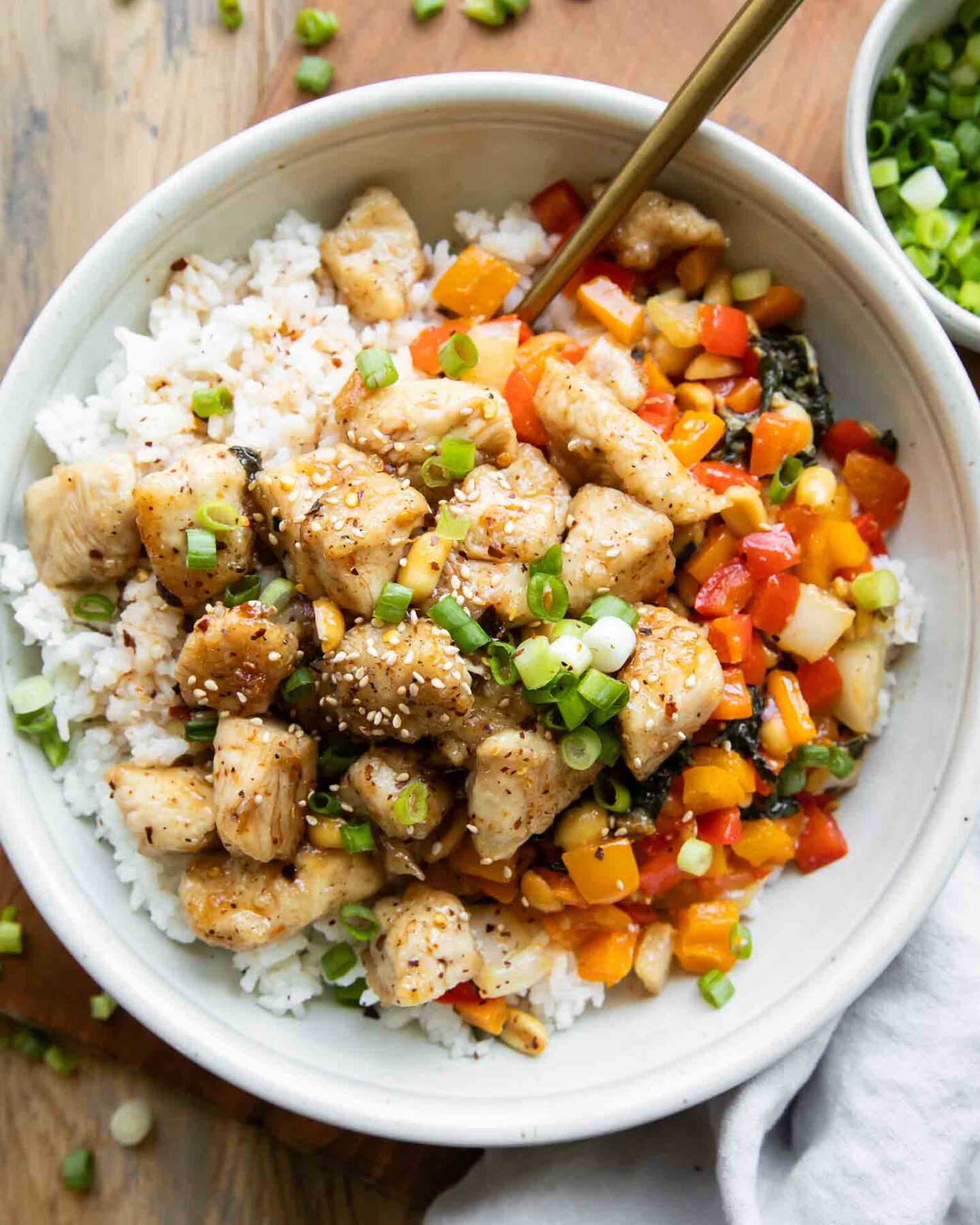 Kung Pao Chicken in a white bowl.