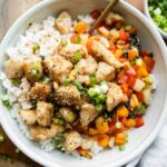 Kung Pao Chicken in a white bowl.