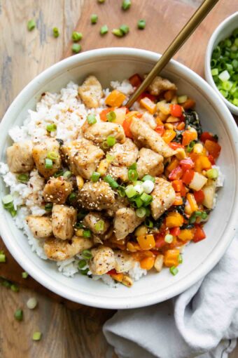 Kung Pao Chicken in a white bowl.