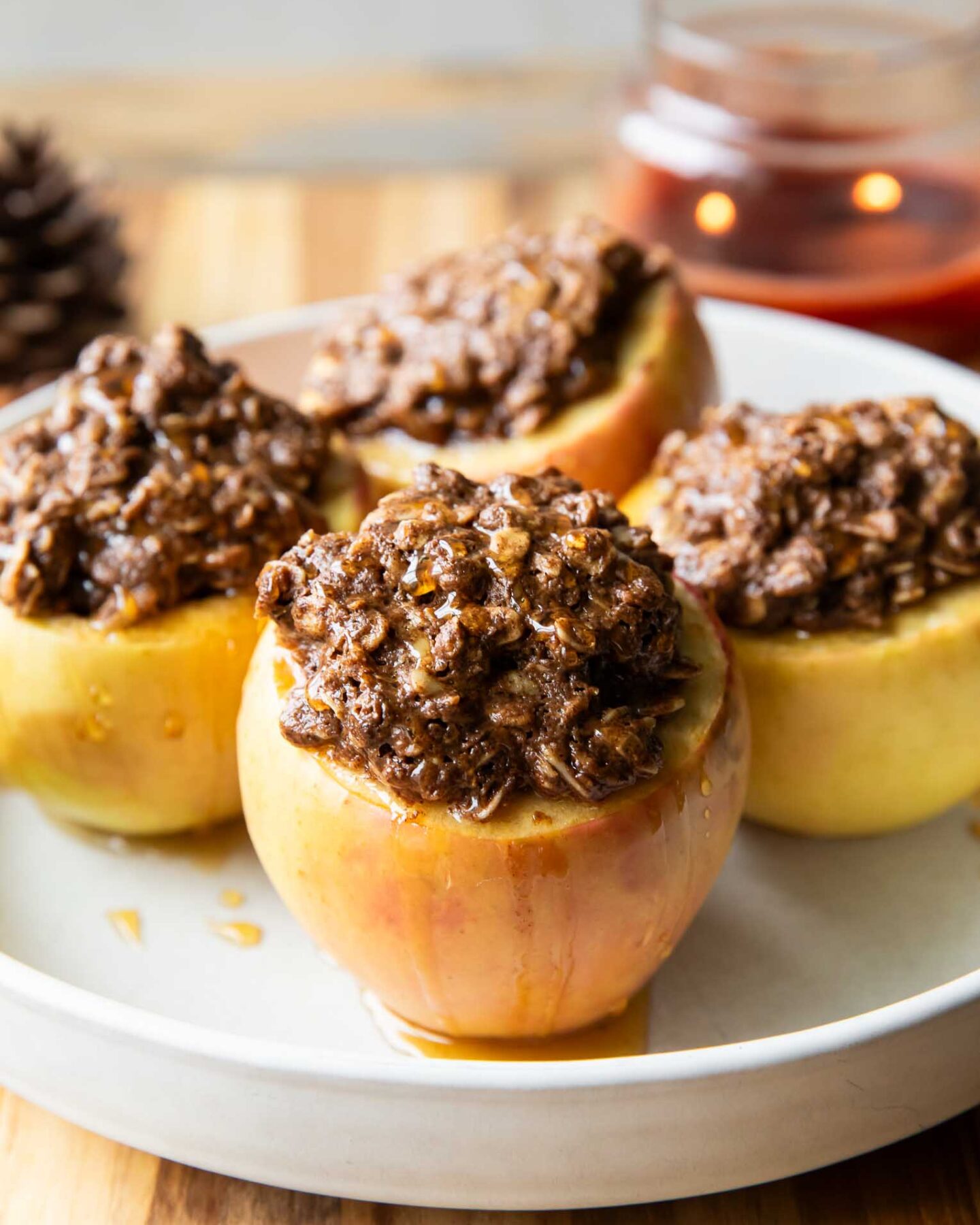 Maple crumble baked apples on a plate.