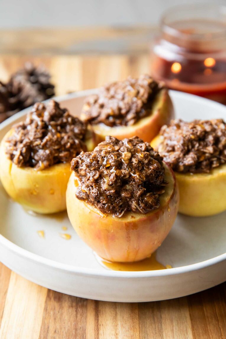 Maple crumble baked apples on a plate.