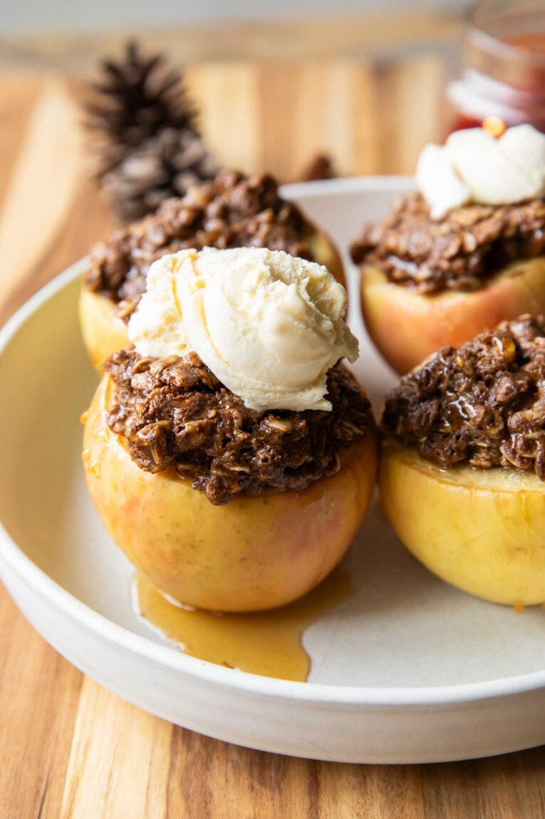 Maple crumble baked apples on a plate.