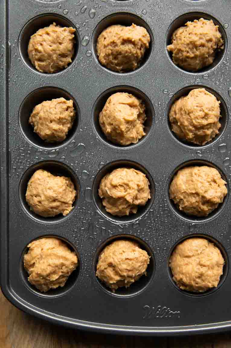 Pumpkin Donut Holes in a baking pan.