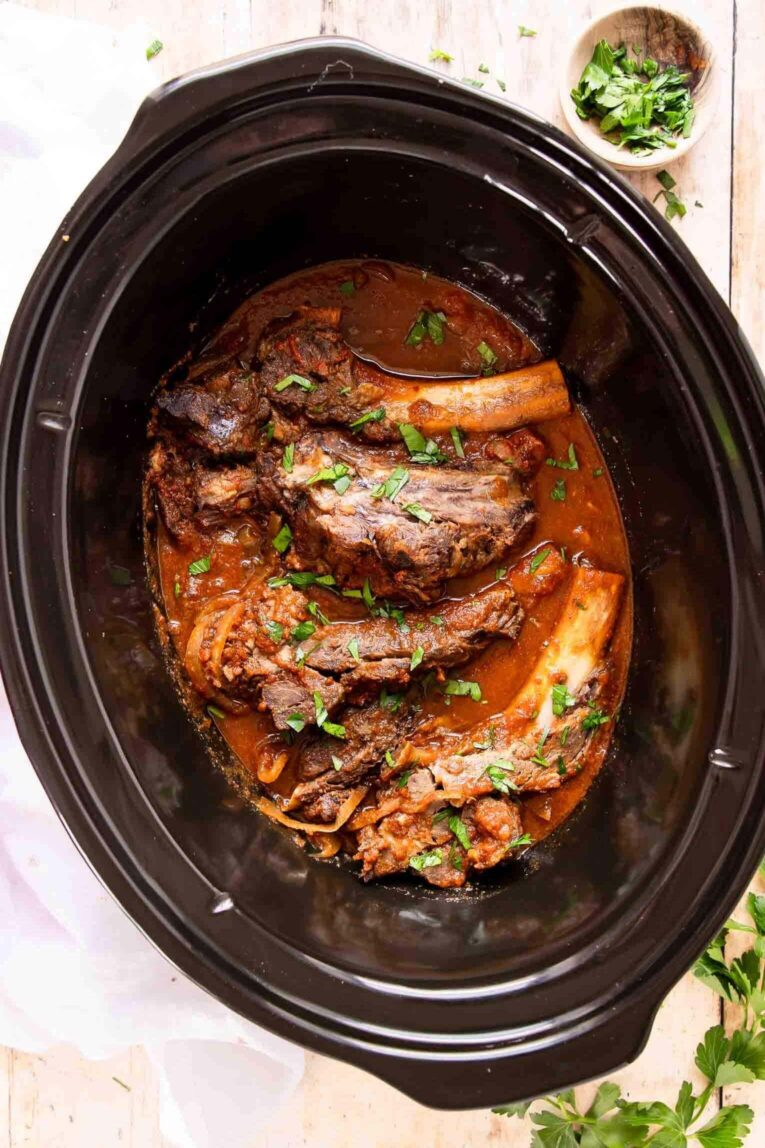 Slow cooker ribs in a crockpot.