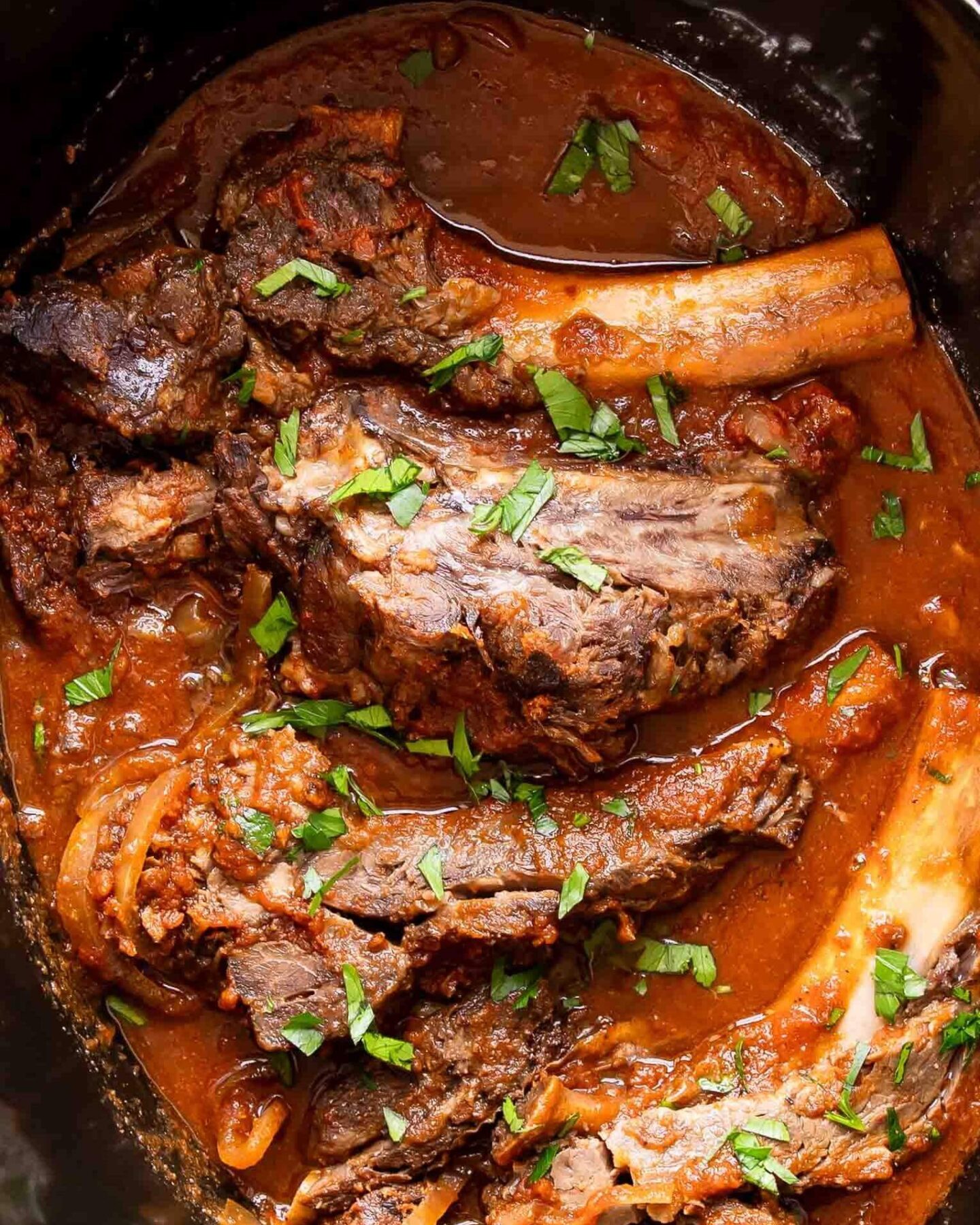 Slow cooker ribs in a crockpot.