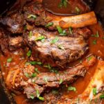 Slow cooker ribs in a crockpot.