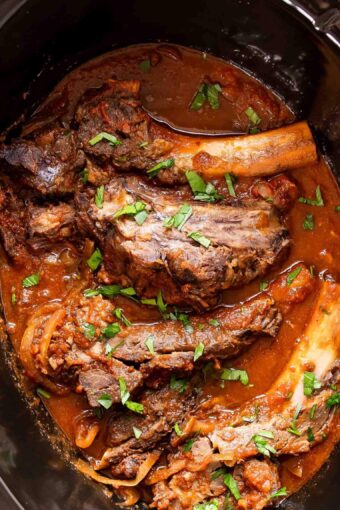 Slow cooker ribs in a crockpot.