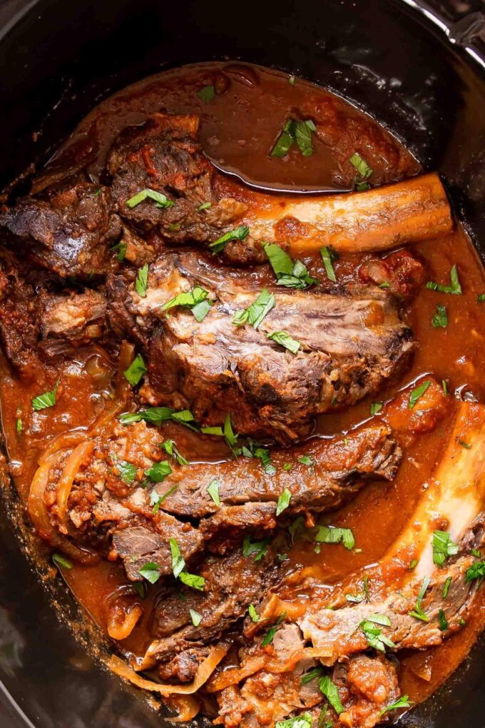 Slow cooker ribs in a crockpot.