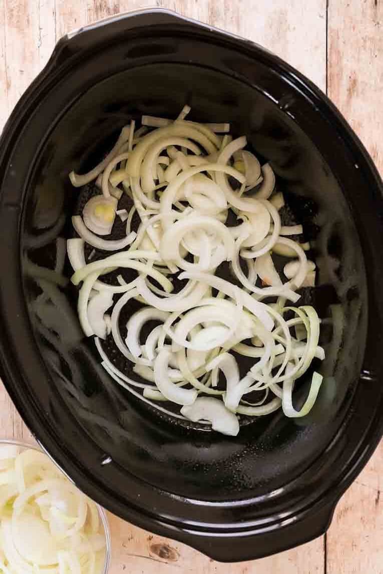 Onions in a crockpot.