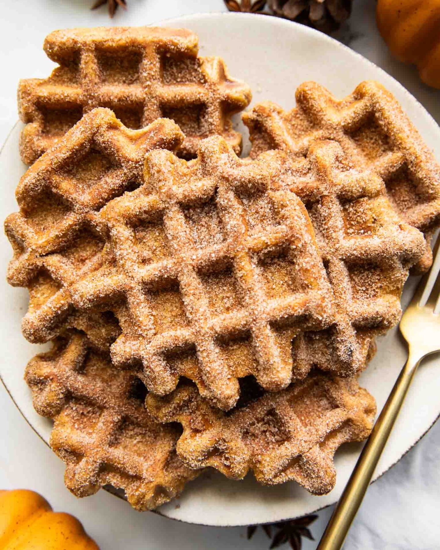 Pumpkin waffles on a plate.