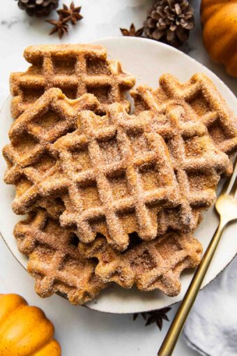 Pumpkin waffles on a plate.