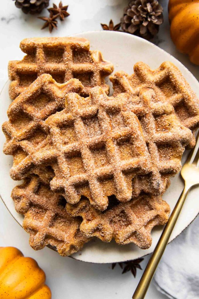 Pumpkin waffles on a plate.