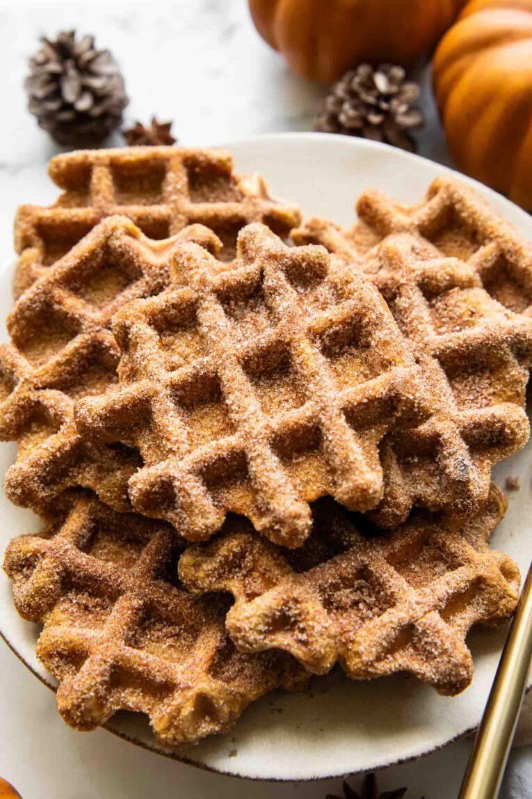 Pumpkin waffles on a plate.