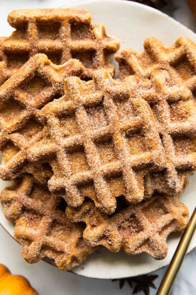 Pumpkin waffles on a plate.