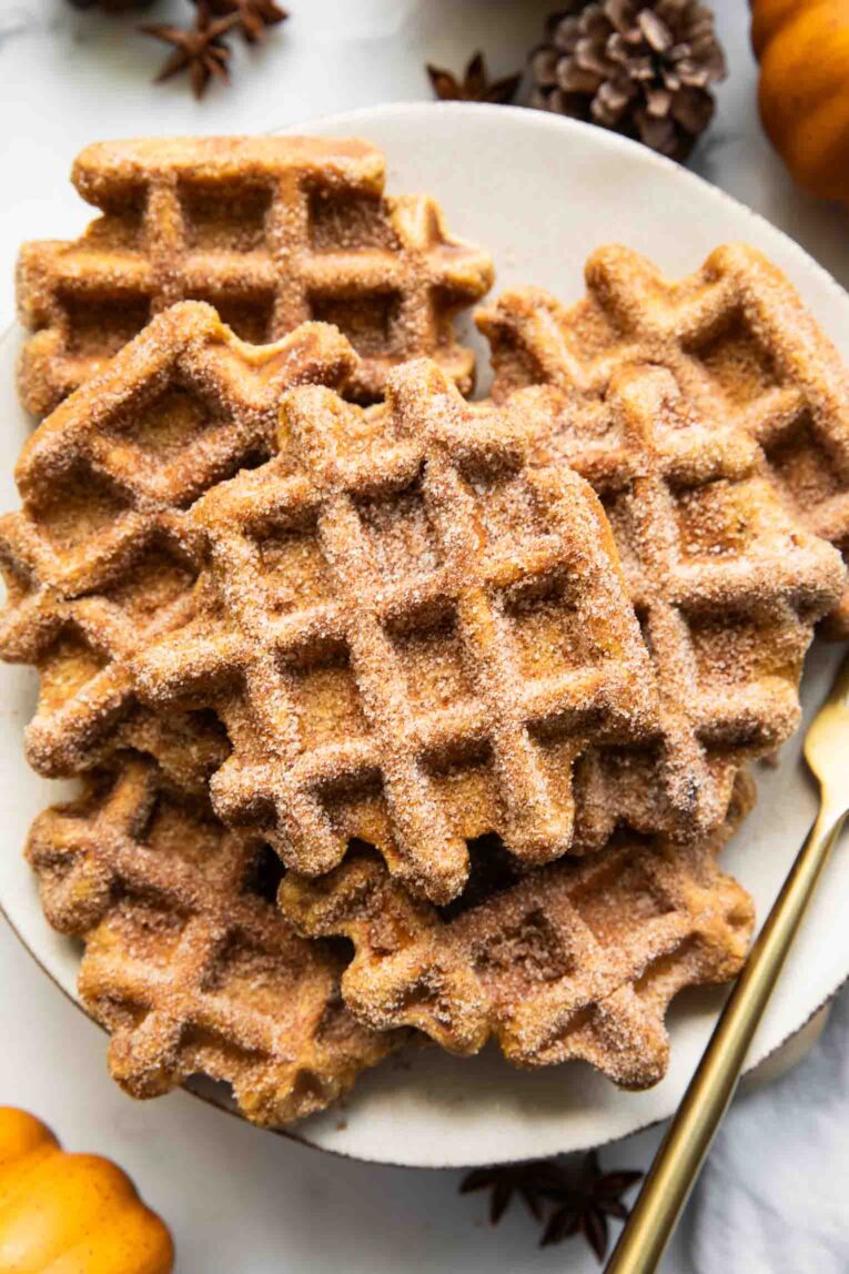 Pumpkin waffles on a plate.