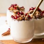 Three pomegranate parfaits.