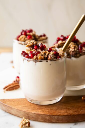 Three pomegranate parfaits.