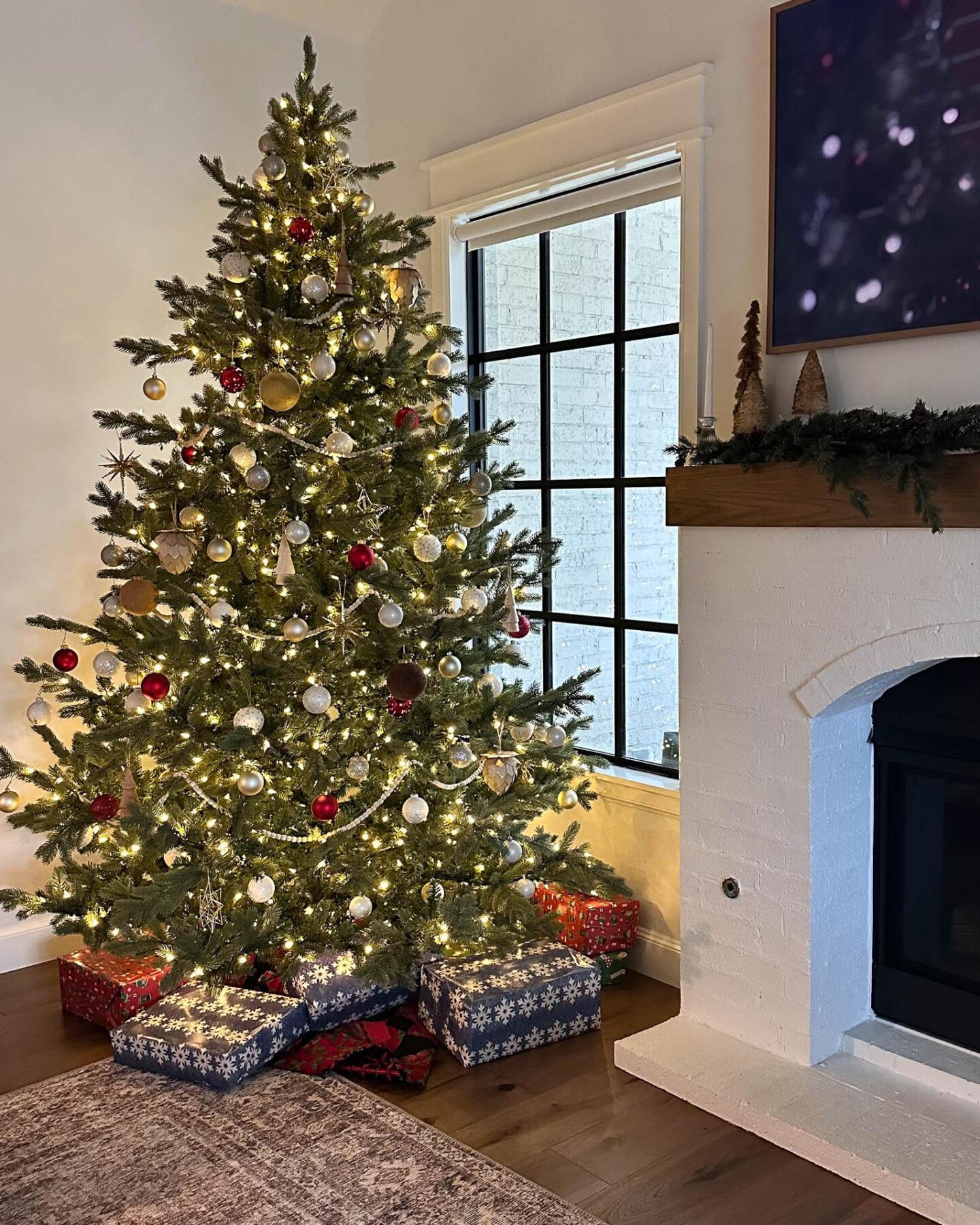 Christmas tree with holiday gifts for a guide.